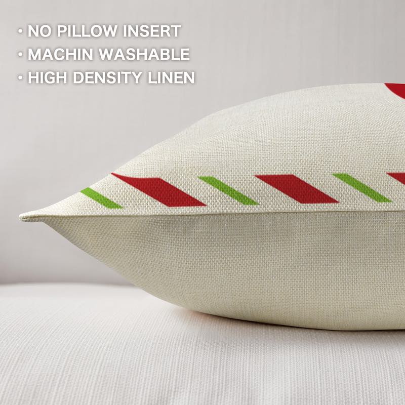 Decorative pillow with red and green pattern on a light background