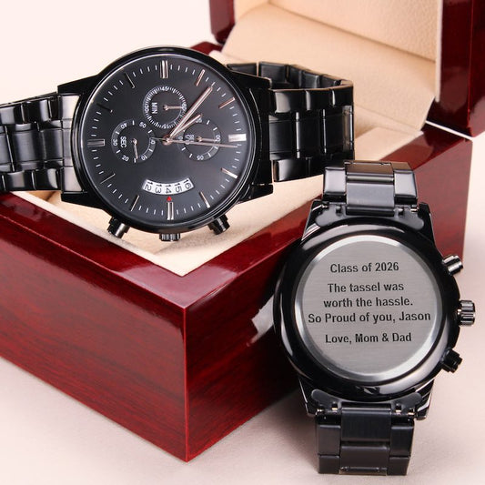 Son graduation gift: black wristwatch with engraved message on a wooden luxury box.