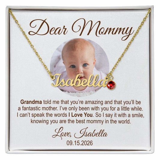 new mom gifts: personalized gold nameplate necklace spelling “Isabella” with a red birthstone charm, presented in a gift box with a customized message card featuring a baby’s photo and a heartfelt message for Mommy.