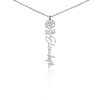 Silver custom vertical name necklace with October birth flower marigold pendant and custom "Elizabeth' engraving on a white background