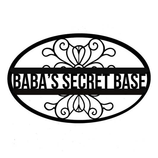 Decorative sign with 'Baba's Secret Base' text and floral designs on a white background