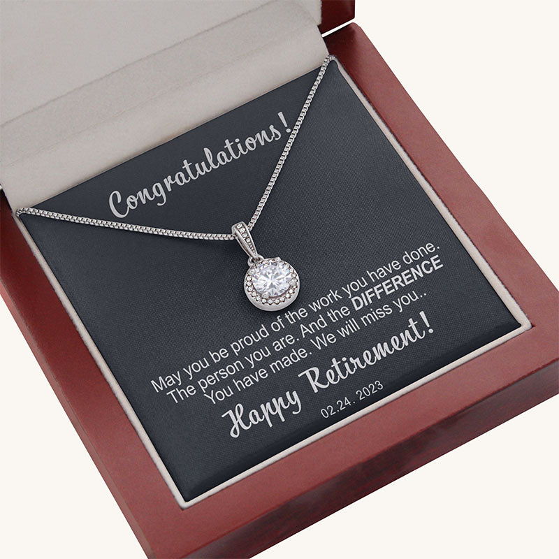 Silver zirconia necklace presented in a red wooden box with a retirement card message