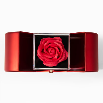 Red rose in a red box on a white background