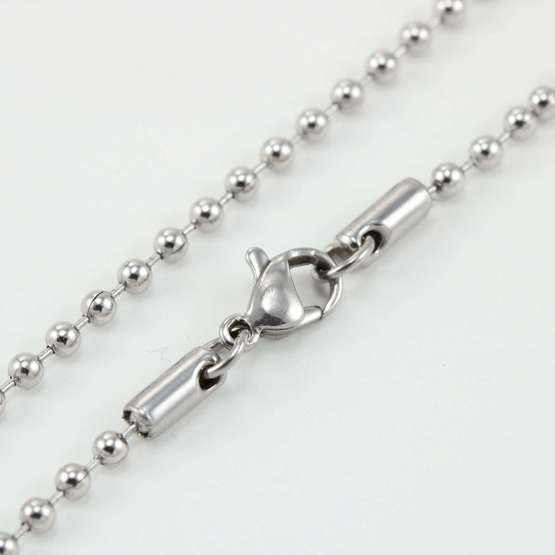 Close-up of a silver ball chain necklace chain with a lobster clasp, indicating the product is a replacement attachment for jewelry making.