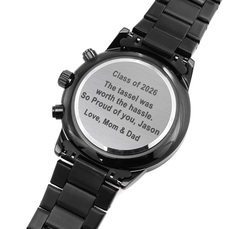 men graduation gift: black watch with engraved message on a white background.