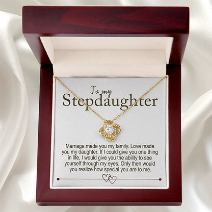 Gold necklace in a wooden box with a sentimental message for a stepdaughter.