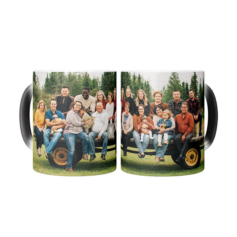 Two magic mugs with a printed family photo on a white background.
