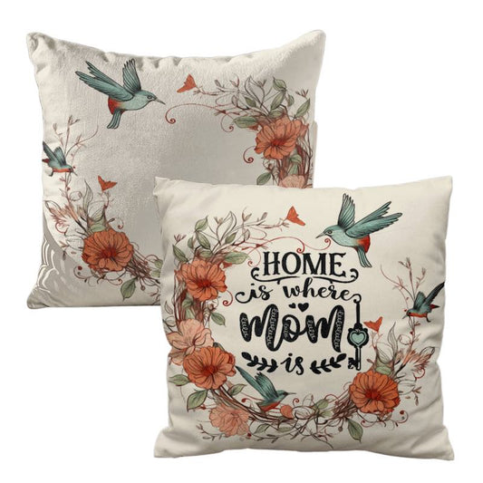 Two decorative pillows with floral designs and text on a white background
