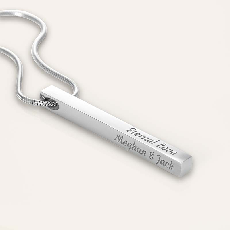 Personalized Bar Necklace: Silver necklace with a bar pendant engraved with 'Eternal Love Meghan & Jack' on a white background.