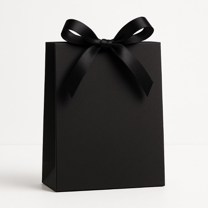 Black gift bag with a black ribbon on a white background
